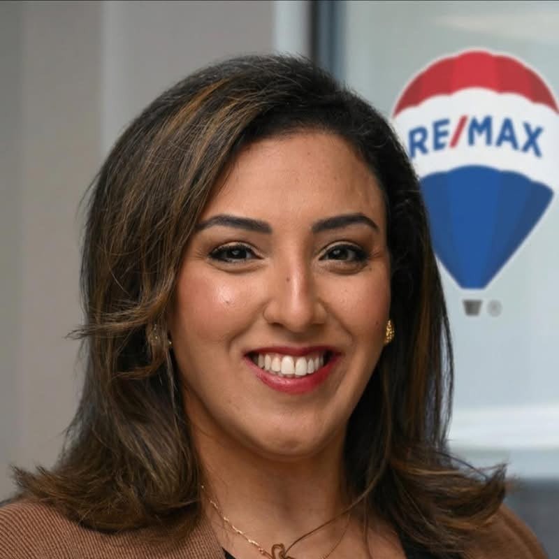 Portrait of Lilian Hanna, real estate sales representative with RE/MAX Metropolis